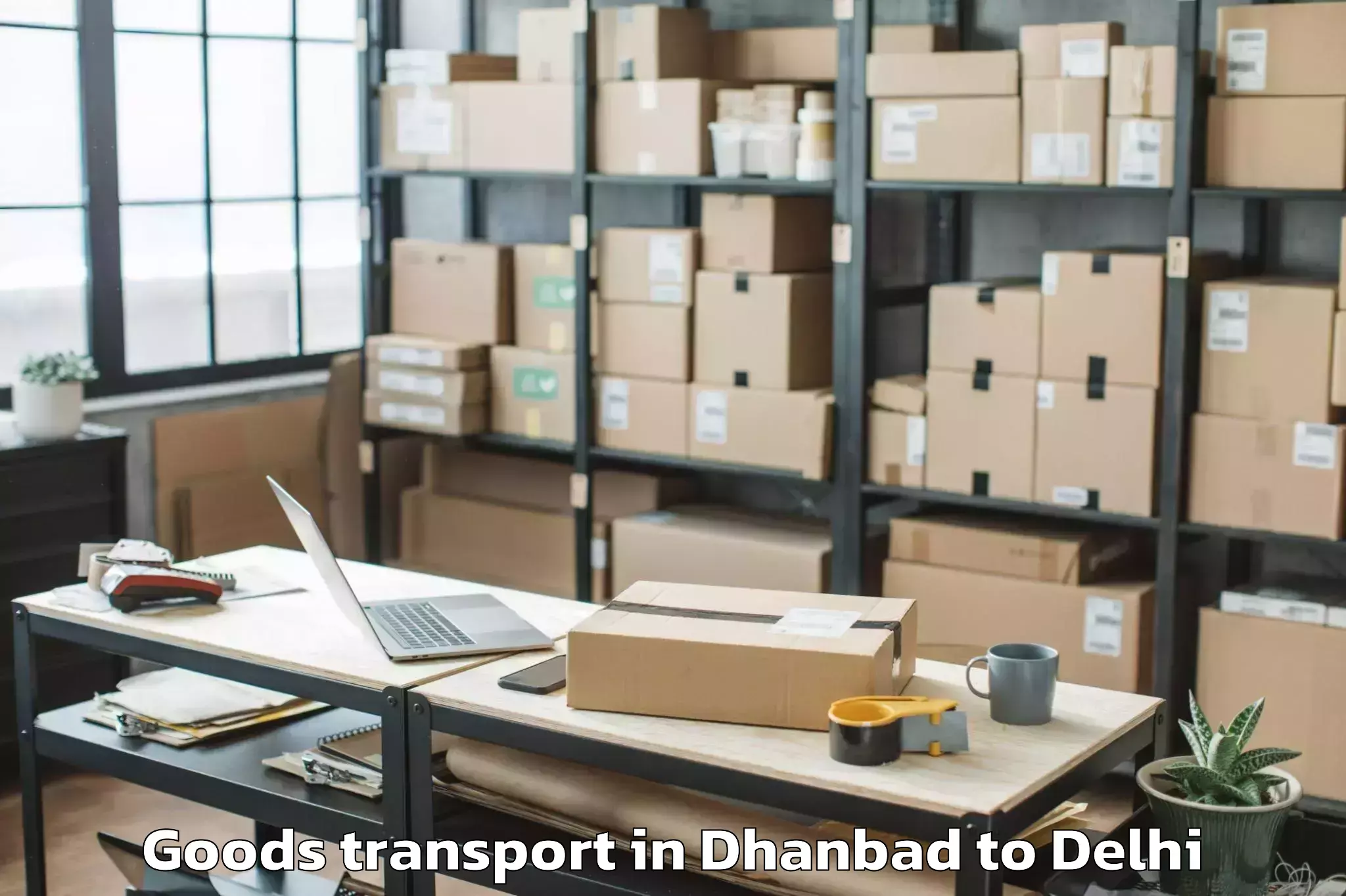 Book Dhanbad to Jamia Millia Islamia New Delhi Goods Transport